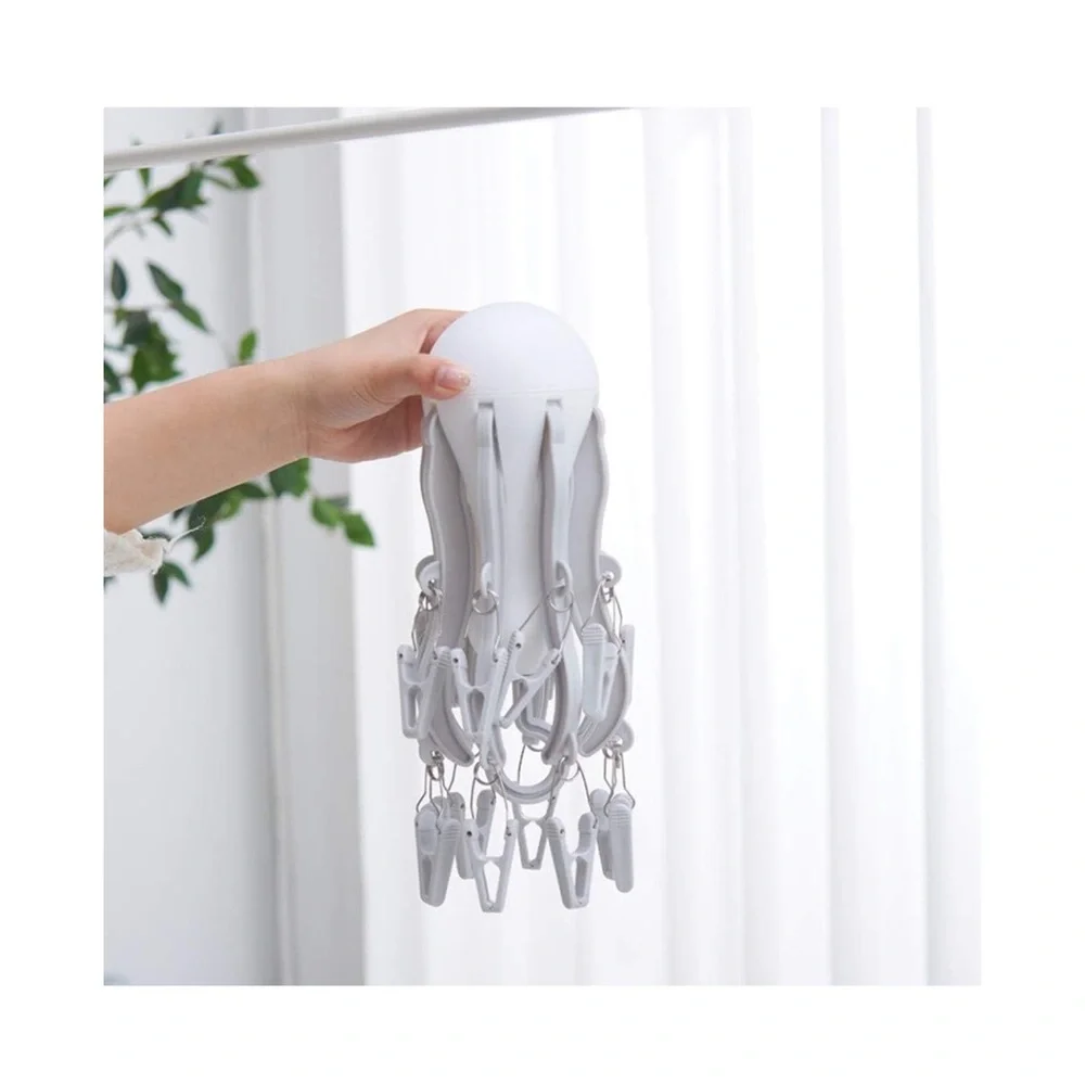 Foldable clip and drip hanger new never used